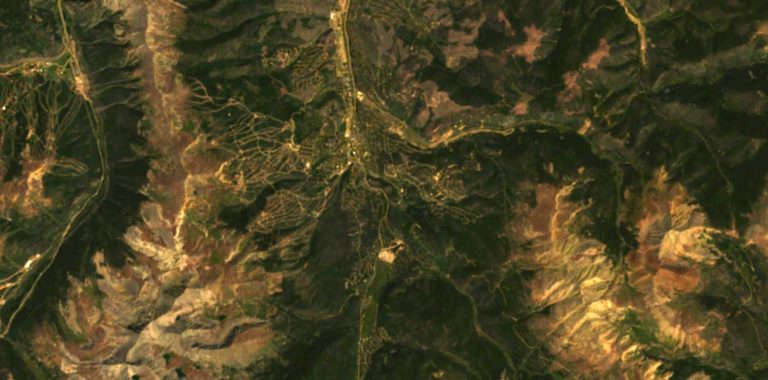 Realistic representation of a satellite image of mountains in the summer