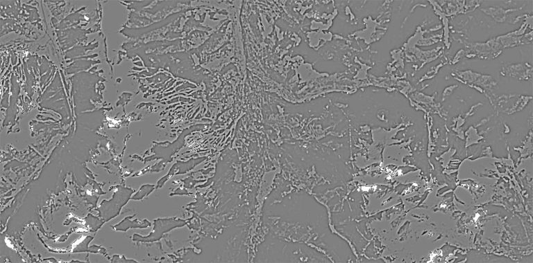 Abstracted representation of a satellite image of mountains in the winter