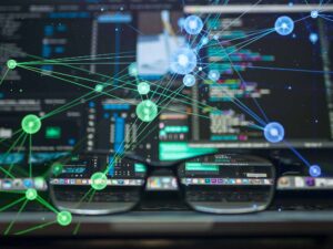 Some futuristic AI/code mishmash of a computer screen and AI node/graph network graphics. And a pair of eyeglasses.